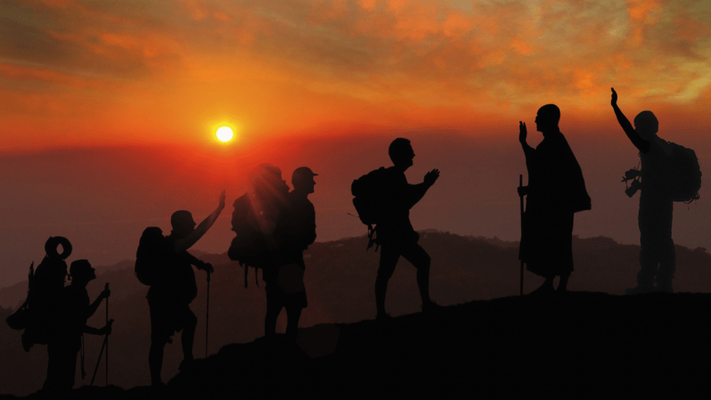 a group of people hiking in the mountain