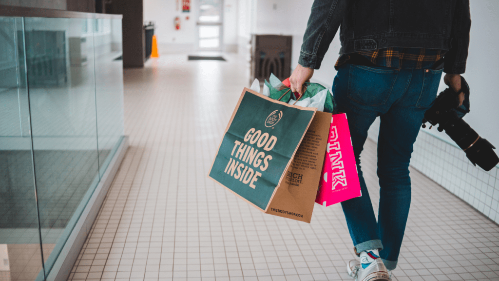 a person holding a paper bag